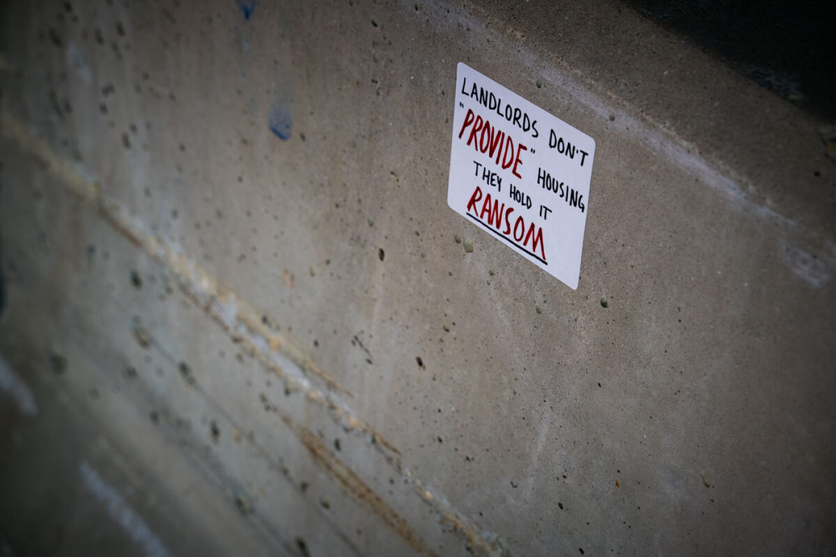 Anti-Landlord Sticker on Downtown Wall — Minneapolis