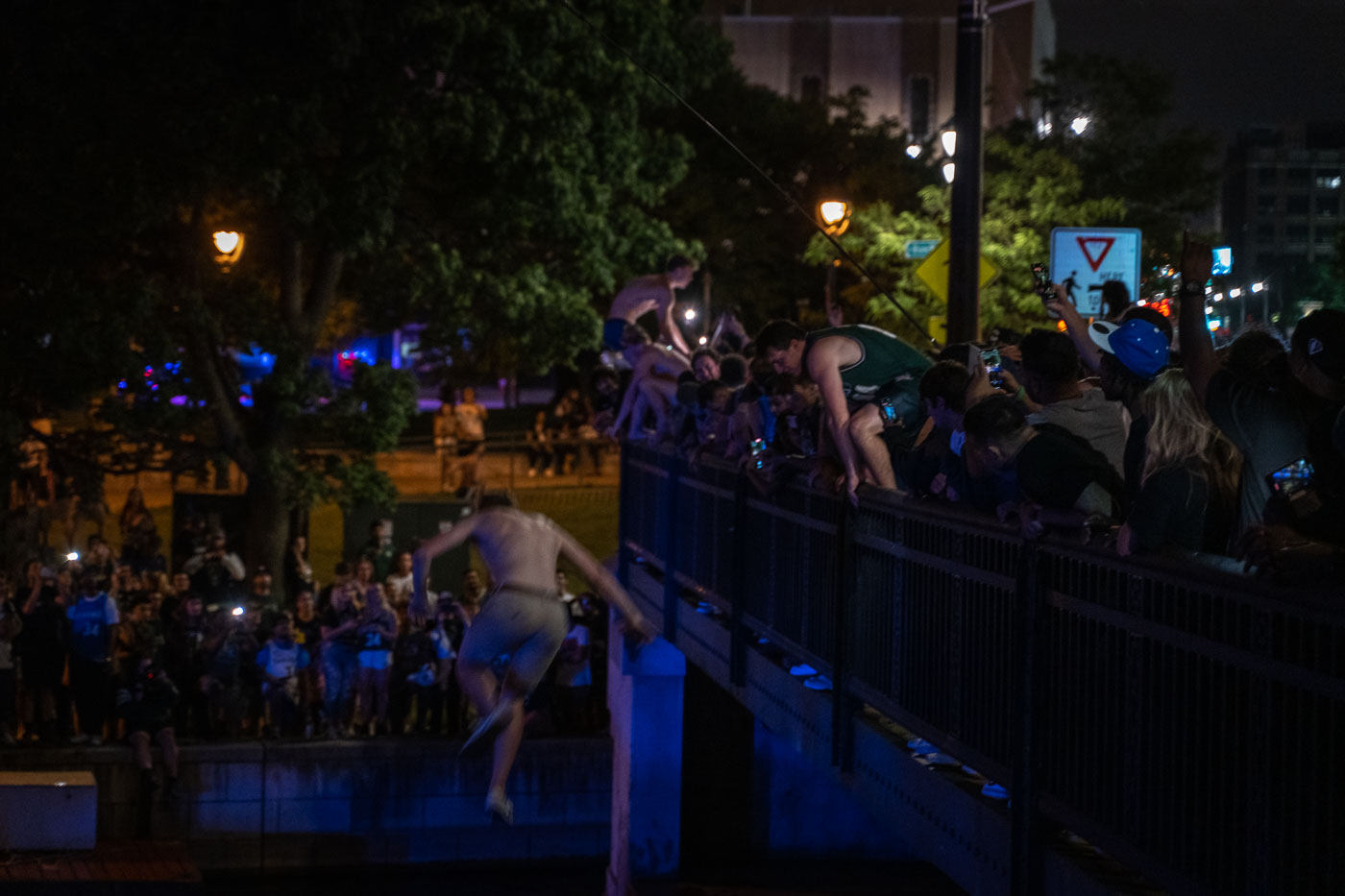 Fans jump in river after winning NBA Championship