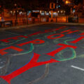 "Love Hope Unity" written in a parking lot on Franklin Avenue and Nicollet Avenue in Minneapolis.