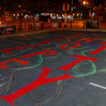 "Love Hope Unity" written in a parking lot on Franklin Avenue and Nicollet Avenue in Minneapolis.