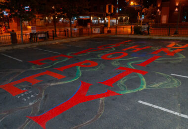 "Love Hope Unity" written in a parking lot on Franklin Avenue and Nicollet Avenue in Minneapolis.