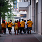 "Outreach Experts" walk the streets of Downtown Minneapolis.