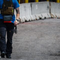 Private security clears out the Winston Smith and Deona Marie memorial in Uptown Minneapolis. Some of the contractors were carrying restraint zip ties while being armed with military fatigue. The space had been a protest zone after law enforcement killed Winston Smith on June 3rd. Deona Marie was killed 10 days later when a man drove through barricades into the protesters.