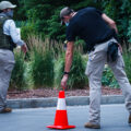 Private security clears out the Winston Smith and Deona Marie memorial in Uptown Minneapolis. Some of the contractors were carrying restraint zip ties while being armed with military fatigue. The space had been a protest zone after law enforcement killed Winston Smith on June 3rd. Deona Marie was killed 10 days later when a man drove through barricades into the protesters.