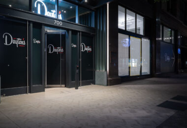 The Dayton’s Project in downtown Minneapolis, located at 700 Nicollet Mall, redevelops the historic Dayton’s department store building into a mixed-use complex of offices, retail, and dining. Originally opened in 1902 and later operating as Macy’s, the site was a cornerstone of the city’s retail history for over a century. The renovation preserves the building’s Beaux-Arts character while transforming it into a hub for modern workspaces and commerce—symbolizing Minneapolis’s broader efforts to revitalize its downtown core.