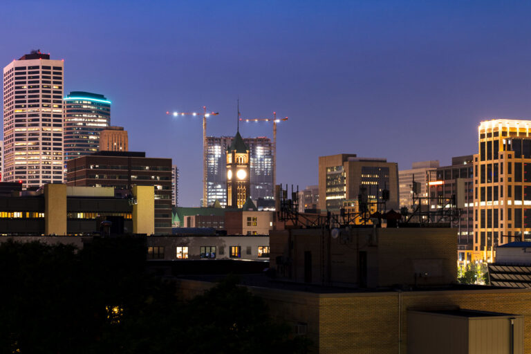 Tower cranes at Gateway site 1 Tower cranes around the gateway project behind Minneapolis City Hall.