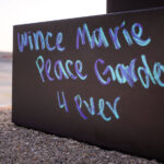 "Wince Marie Peace Garden 4 Ever" written in chalk near where Winston Smith was killed.