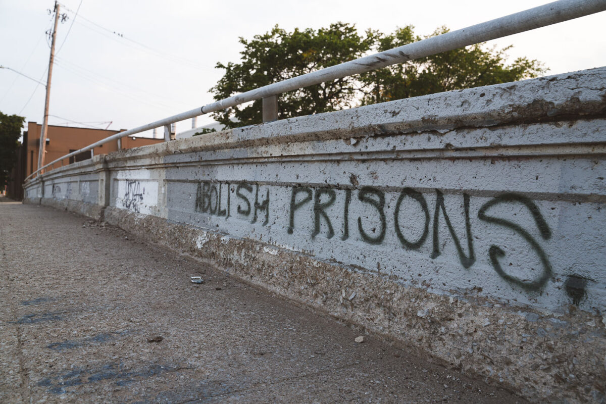 "Abolish Prisons" written on a bridge in South Minneapolis.