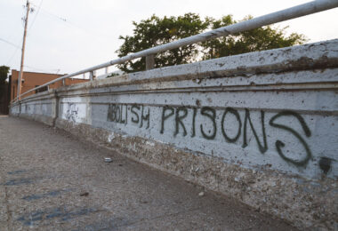 "Abolish Prisons" written on a bridge in South Minneapolis.