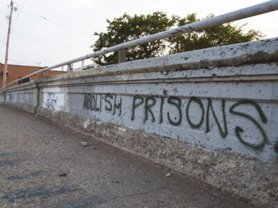 Abolish Prisons Graffiti on South Minneapolis Bridge