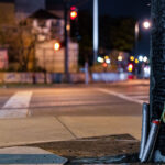 A burned light post across the street from the Minneapolis Police Third Precinct.