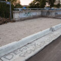 "Defund Police Please?" written on a street curb in South Minneapolis.