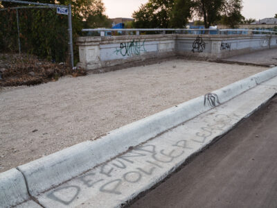 Defund Police Graffiti on South Minneapolis Curb
