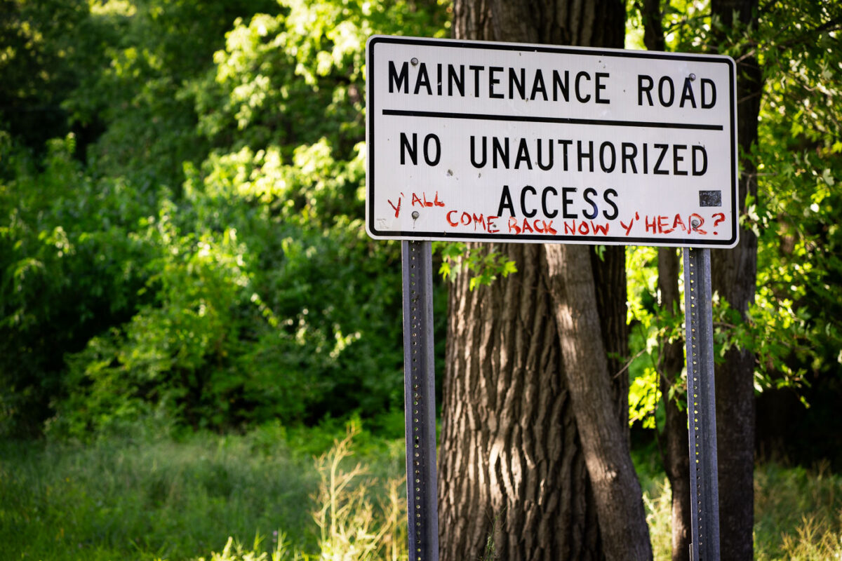 Maintenance Road No Unauthorized Access Sign