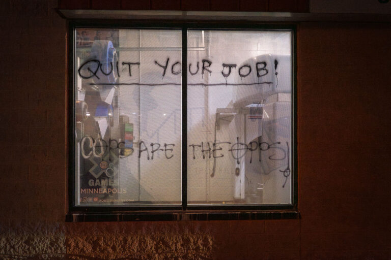 Quit Your Job Cops Are The Opps 3 A car wash across the street from the Minneapolis police fifth precinct.