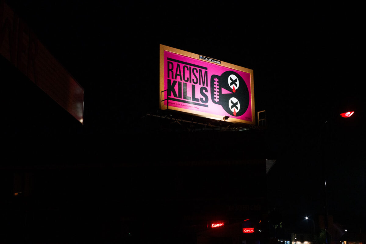 A billboard in George Floyd Square reading "Racism Kills".