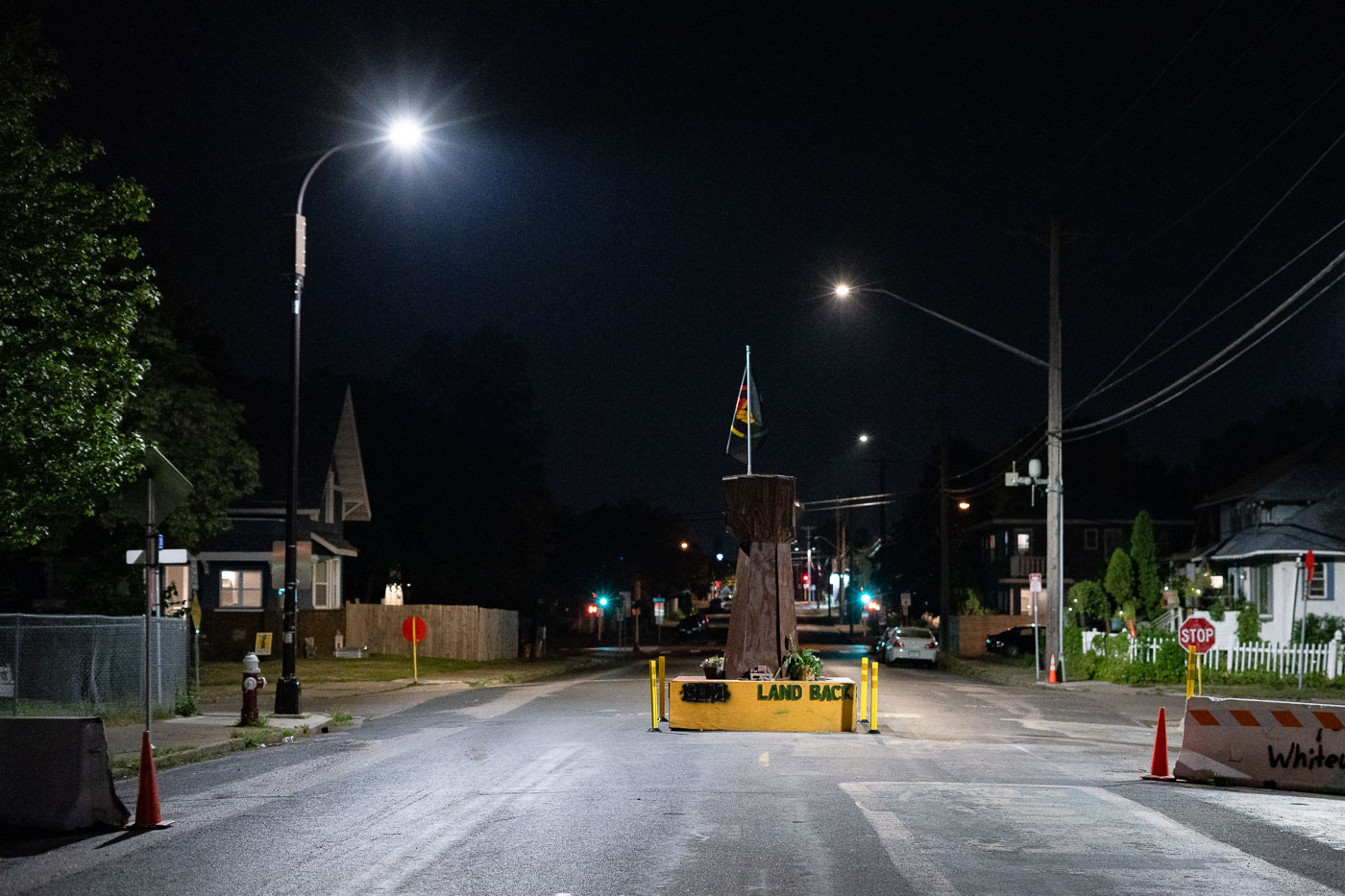 Raised fist at night in George Floyd Square