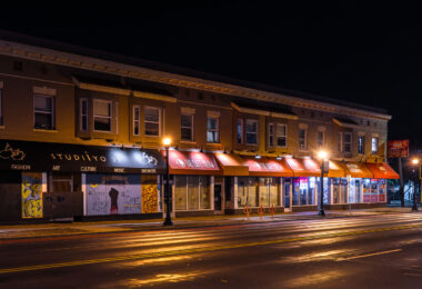 Storefronts still covered in murals on Hennepin Avenue in Uptown Minneapolis.