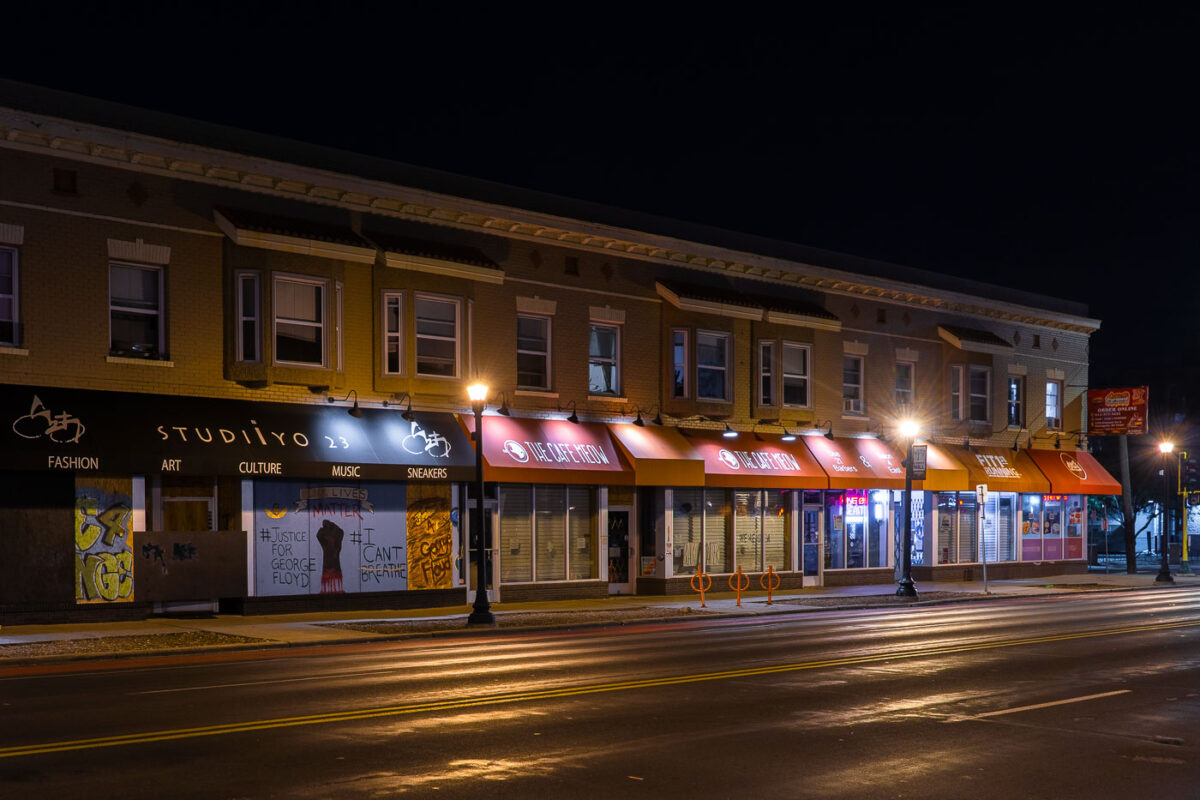 Storefronts still covered in murals on Hennepin Avenue in Uptown Minneapolis.