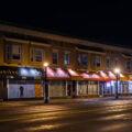 Storefronts still covered in murals on Hennepin Avenue in Uptown Minneapolis.