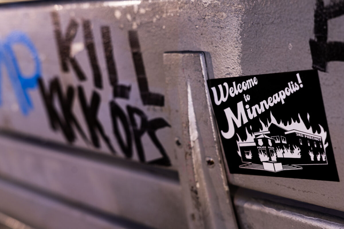 A "Welcome to Minneapolis" sticker on a bench in Minneapolis.