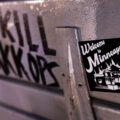 A "Welcome to Minneapolis" sticker on a bench in Minneapolis.