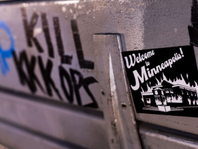 Minneapolis Uprising Sticker on Bench