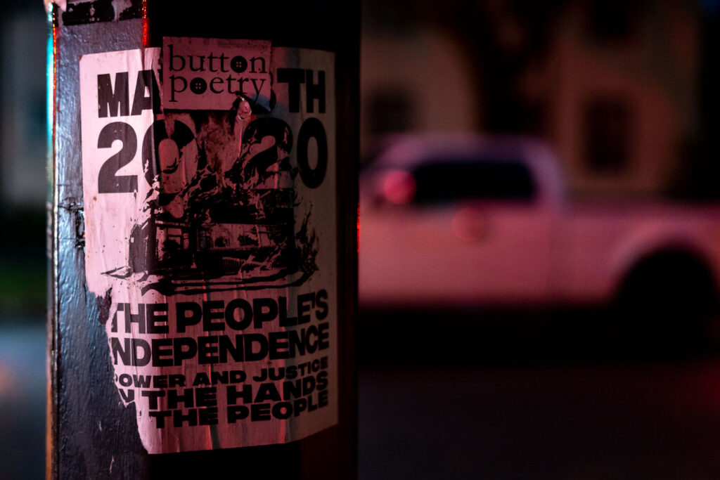 A poster stuck to a street poll in Minneapolis referencing the burning of the third precinct in May 2020.
