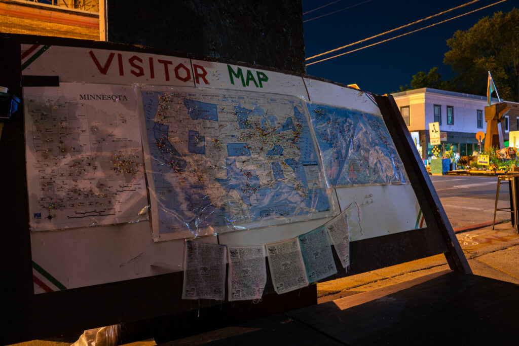 A map with pins signifying the locations of those who have visited the square.