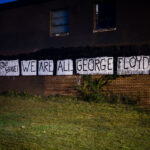 "Be Kind... Stay Brave!" We are all George Floyd" written on the side of a building on Nicollet Avenue in South Minneapolis.