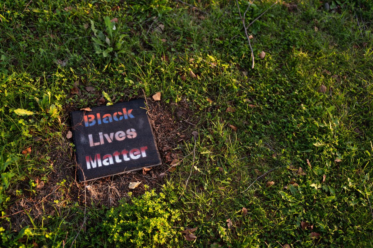 Black Lives Matter stencil on square tile