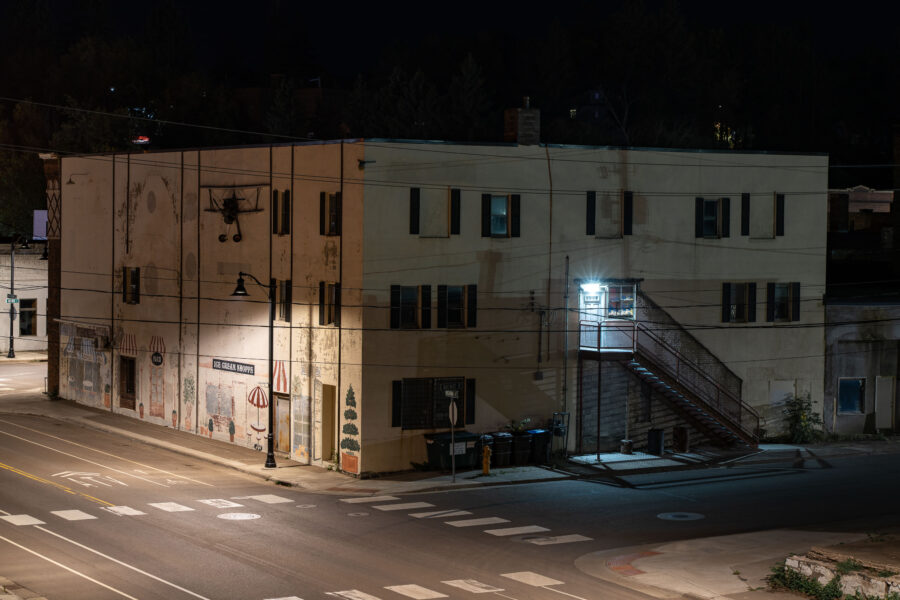 Cloquet, MN: Building with murals at night