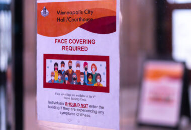 Face Covering Required

A sign seen at Minneapolis City Hall. It states individuals should not enter the building if they are experiencing any symptoms of illness.