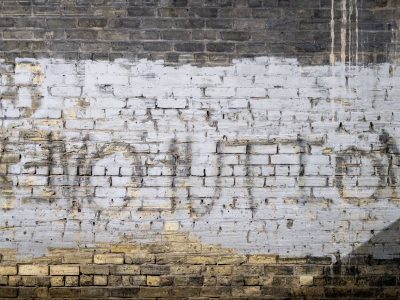 Revolution Graffiti on Minneapolis Brick Wall