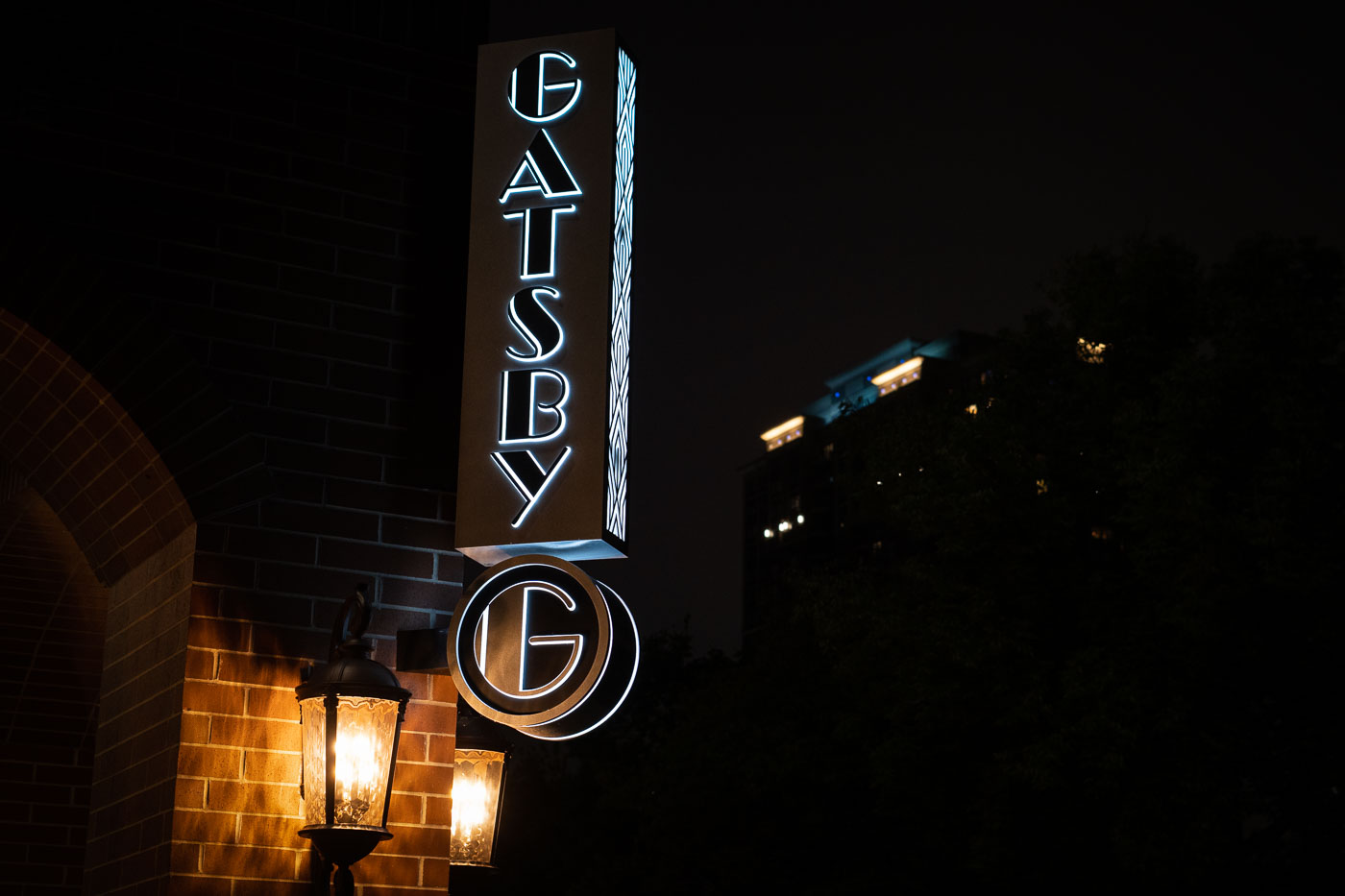 Gatsby apartments in Minneapolis sign at night
