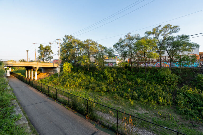 Midtown Greenway, Minneapolis: Overpass and Graffiti 2 Midtown Greenway bike path in Minneapolis passes under an overpass and alongside buildings decorated with graffiti art.