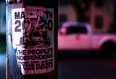 A poster stuck to a street poll in Minneapolis referencing the burning of the third precinct in May 2020.