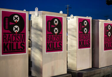 Poster pasted to electrical boxes on the Midtown Greenway in Minneapolis.