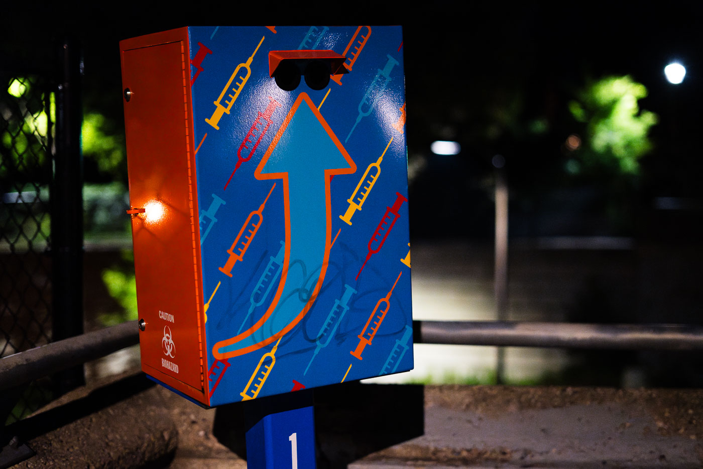 South Minneapolis syringe drop box with biohazard symbol, designed for safe needle disposal and harm reduction.