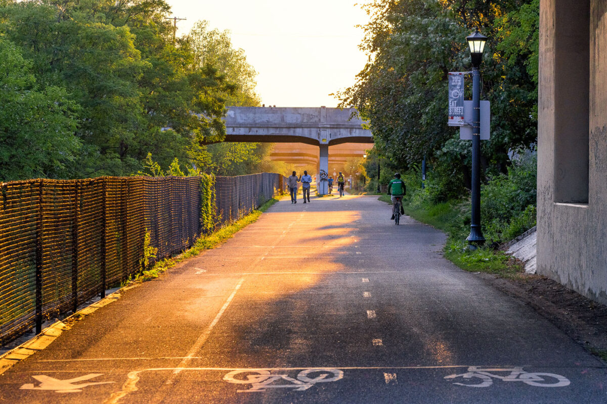 Walkers and Bikers at Sunset on Midtown Greenway