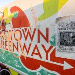 A sign leading to the Midtown Greenway in South Minneapolis.