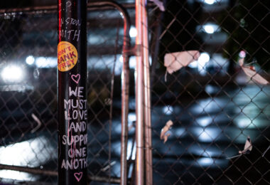 A "Don't Rank Frey" sticker on a pole outside the parking garage where Winston Smith was killed by law enforcement in June, 2021.