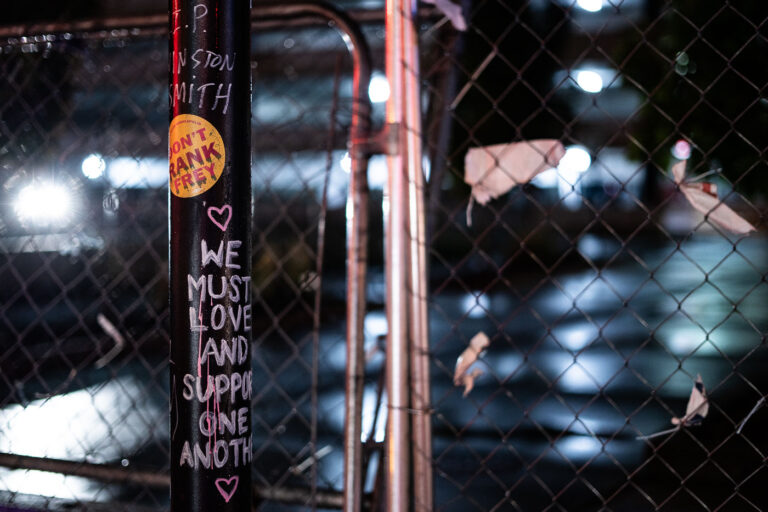 Don't rank Frey We Must Love and Support One Another 4 A "Don't Rank Frey" sticker on a pole outside the parking garage where Winston Smith was killed by law enforcement in June, 2021.