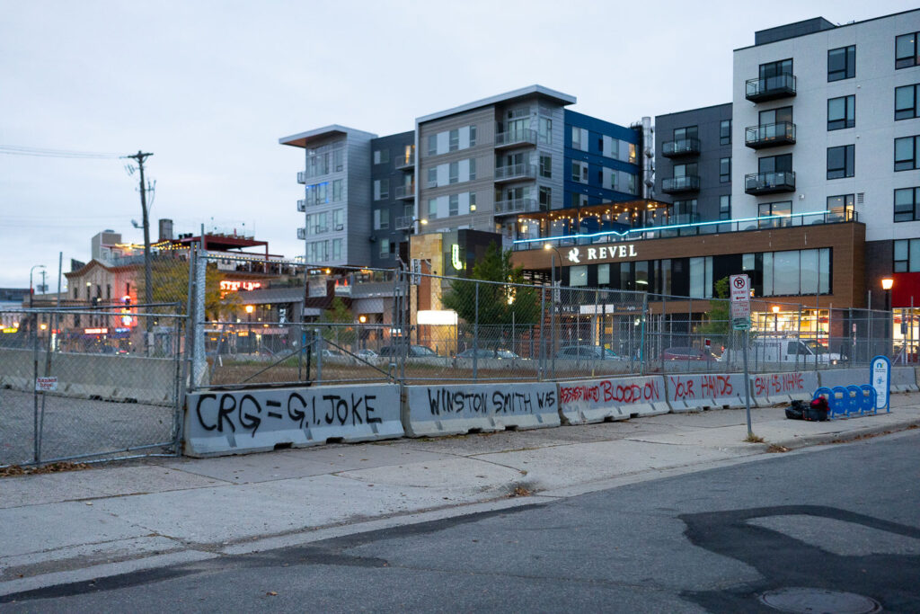Graffiti on the side of concrete barricades that surround the parking garage that Winston Smith was killed by law enforcement on June 3rd, 2021.