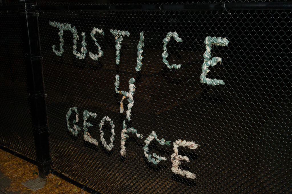 "Justice 4 George" yarn art on fencing at Lake Country School in South Minneapolis.
