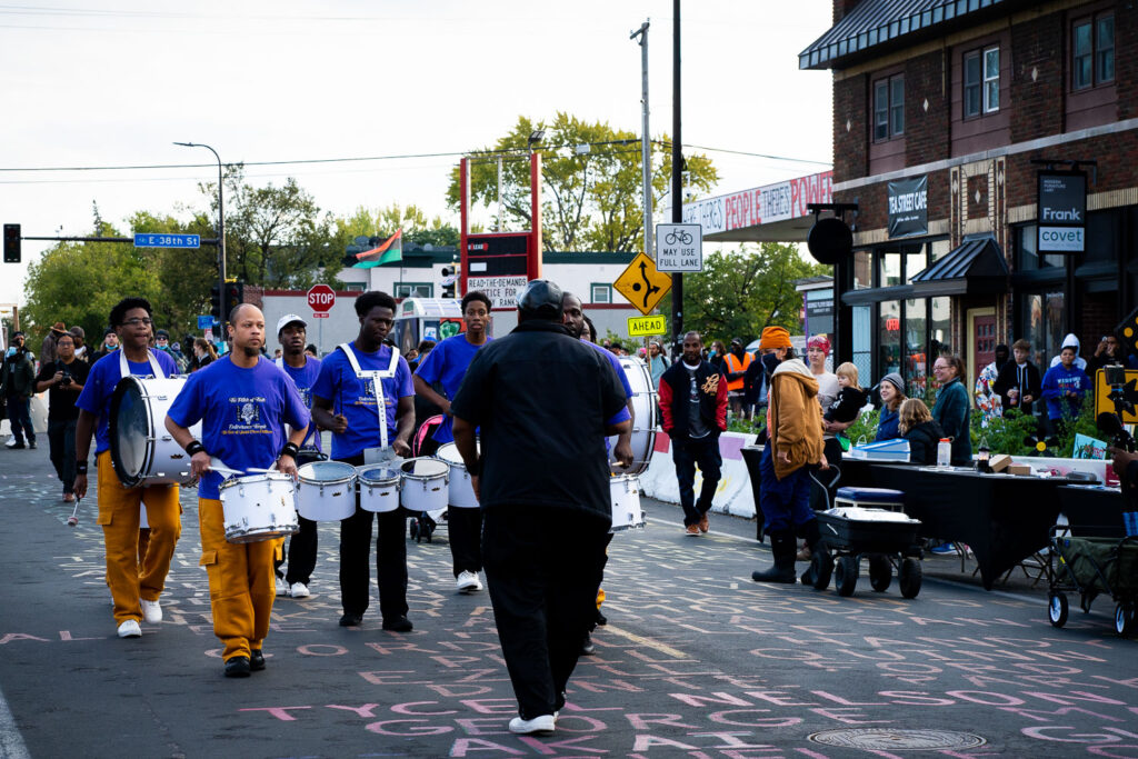 The Pillar of Truth Deliverance Temple Drum Line making it's way down Chicago Avenue.