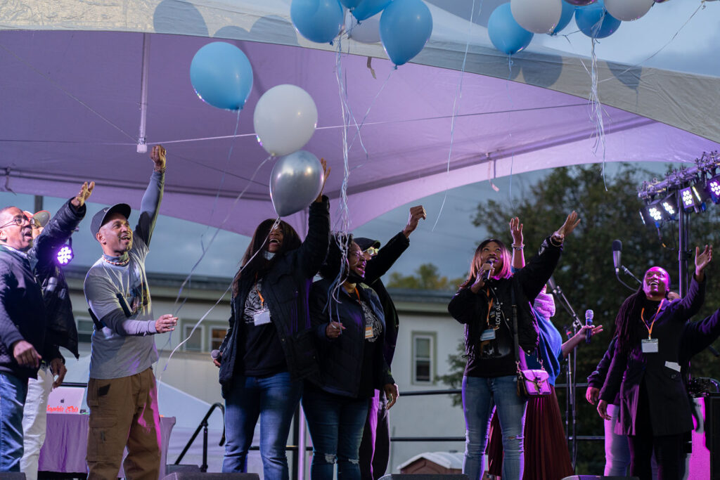 George Floyd’s aunt Angela Harrelson, his cousin Paris Stevens, Jeanelle Austin along with friends of George Floyd release balloons on what would have been his 48th birthday.   The event at George Floyd Square was put together by the George Floyd Global Memorial.