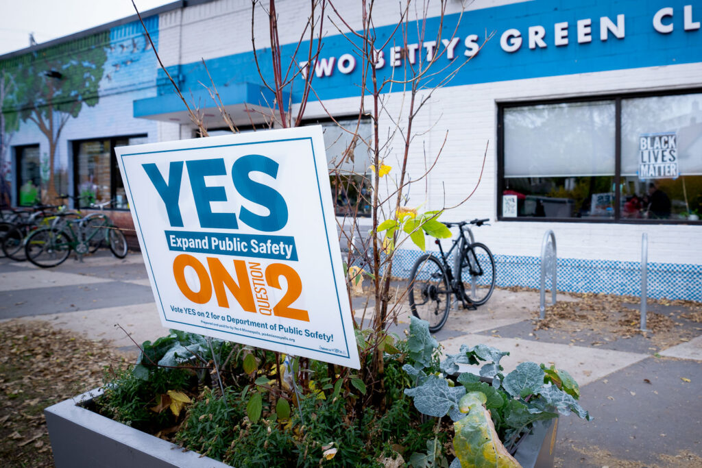 A "YES ON 2" yard sign on Minnehaha Ave during Open Streets.