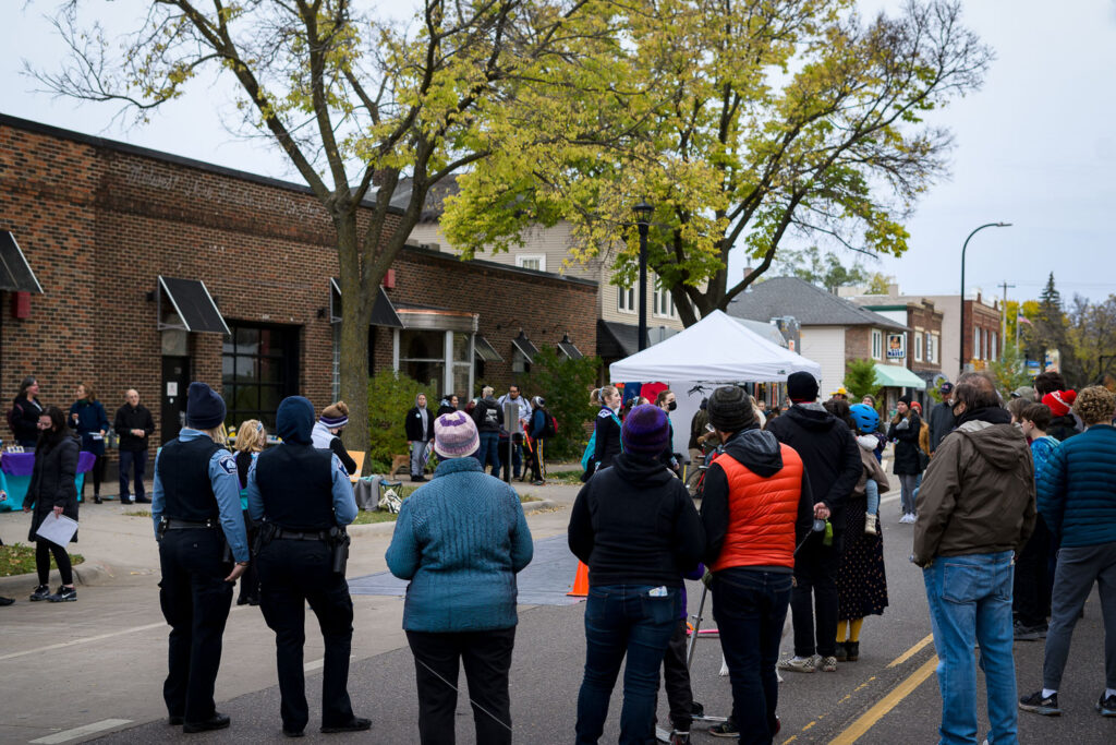 Minneapolis Police watch as dancers perform at Open Streets Minnehaha.