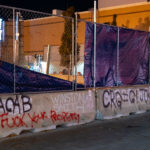 ACAB, Fuck Your Property, CRG=GI JOKE written on barricades outside the parking ramp that Winston Smith was killed by law enforcement in June 2021.
